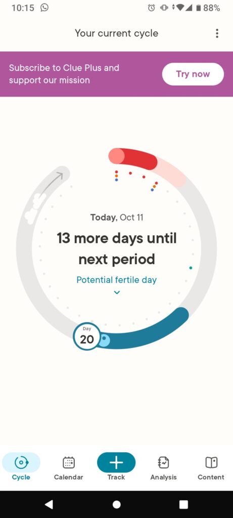 A screenshot of a phone. It says your current cycle at the top of the page. In the middle of the page is a hollow circle with the words today, Oct 11, 13 more days until next period, potential fertile day. Around the semi-circle it has a red bit at the top then followed by a grey part and then a blue and a grey part again which shows the cycle of the period. At the very bottom of the page are tabs which say cycle, calendar, track, analysis and content.
